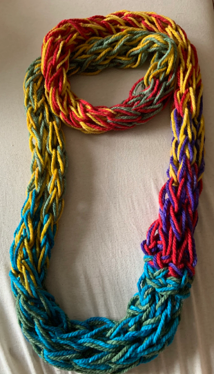 Rainbow "ugly holiday sweater" Hug